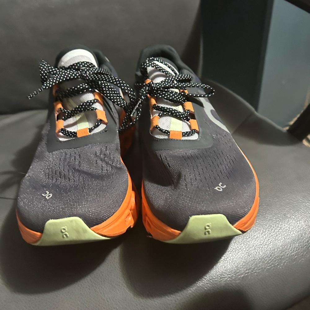 On Cloud shoes. Gray and orange, super comfortable. Size 9.5